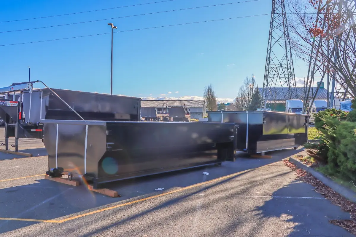 Roll-off dumpster ready for waste disposal at job site for 12 Yard Dumpster Rental in Fontana